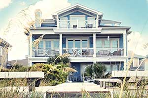 Seaside Park Real Estate, Blue 3-story beach home with balconies