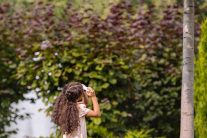 Girl inspecting Little Egg Harbor tree removal company service